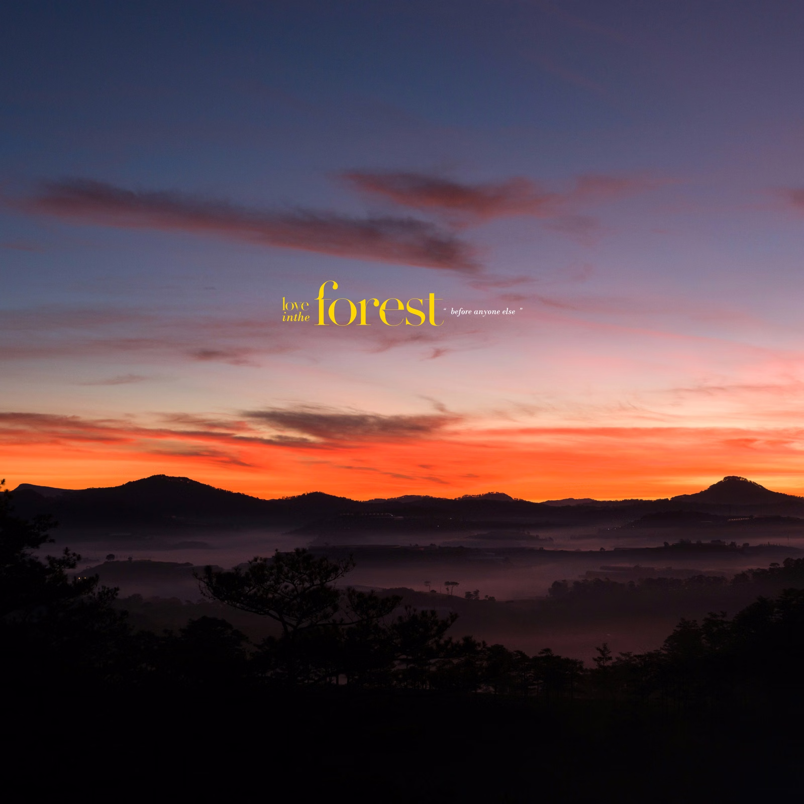 Red-orange dawn sky above mountains and clouds at Đồi Trọc Da Lat