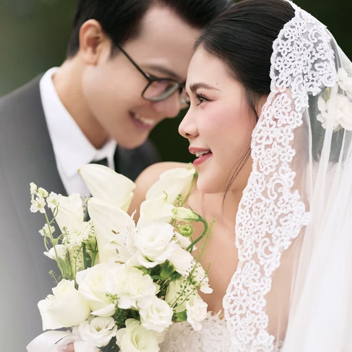 The couple touches foreheads with a white bouquet at Cây Thông Cô Đơn, Đà Lạt