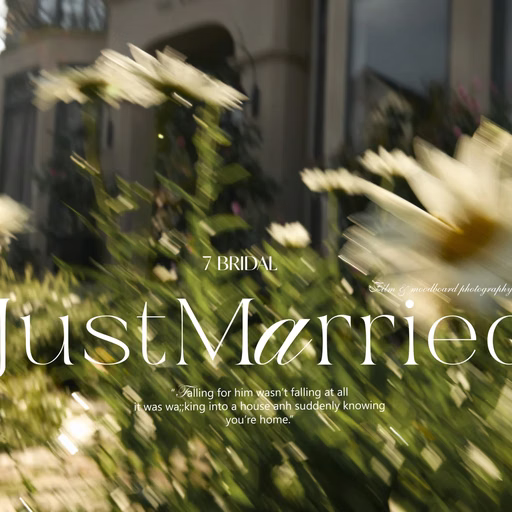 White daisies in front of a building with the words Just Married at The Nest, Da Lat